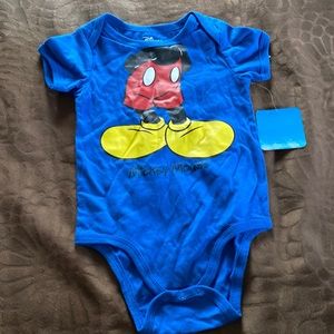Mickey Mouse onsie.